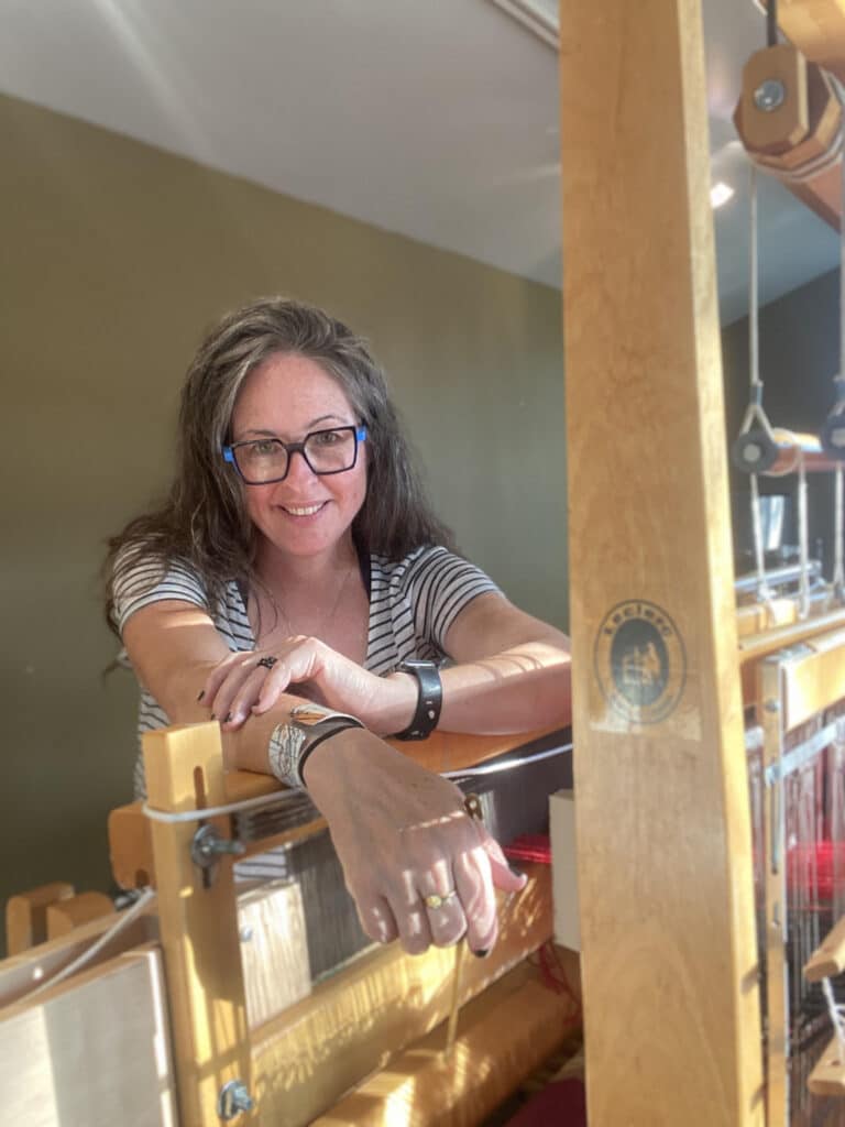 Portrait of Liz Pead by her loom